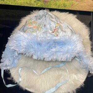 Newborn size fuzzy, satin/silk-like tassel hat with blue satin booties